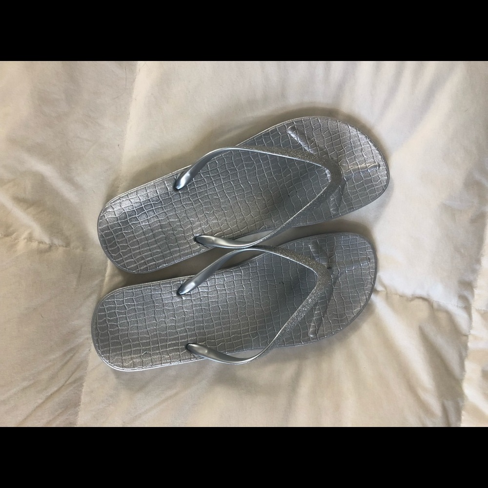 Silver metallic flip flops. Size 10